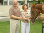 Avram C. Freedberg and his wife, Rhoda, stroke Ahvee’s Destiny’s snout.