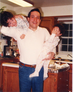 Avram and the kids in their kitchen of their first home in Stamford, 1979.